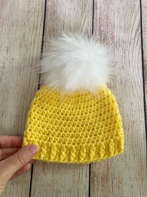 Yellow faux fur pom pom hat